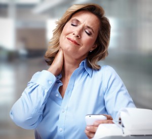 Business woman having a neck pain. Stress and depression